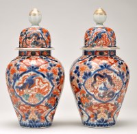 Lot 491 - Pair of 'Imari' octagonal ovoid vases and...