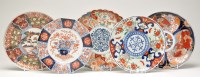 Lot 497 - Six Japanese 'Imari' dishes, each with central...