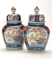 Lot 502 - Pair of 'Imari' ovoid vases and cover, with...