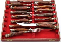 Lot 521 - Eight meat eating knives and eight forks to...