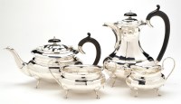 Lot 527 - A George V four-piece tea service, by Viners,...