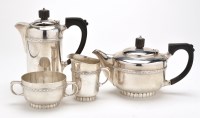 Lot 552 - A George VI four-piece tea service, by James...