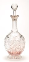 Lot 561 - An Elizabeth II cut glass decanter with silver...