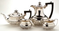 Lot 568 - A matched George VI four-piece tea service, by...