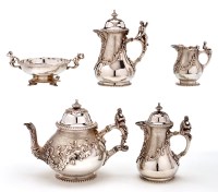 Lot 588 - An early 20th Century five-piece tea and...