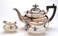 Lot 627 - An Edwardian sugar bowl and matching milk jug,...