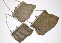 Lot 678 - Three silver chain mail evening purses, to...