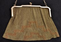 Lot 691 - A George V 9ct. gold mesh evening bag, the...