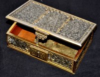 Lot 714 - A gilt white metal box, profusely decorated...