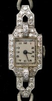 Lot 719 - A lady's white precious metal and diamond set...