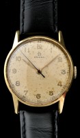 Lot 733 - Omega: a gentleman's 18K gold cased wristwatch,...