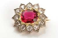 Lot 761 - A red paste and diamond cluster brooch, the...