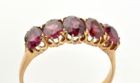 Lot 767 - A five stone amethyst ring, the graduated oval...