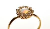 Lot 772 - An opal and diamond cluster ring, the opal...