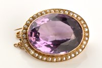 Lot 790 - An amethyst and seed pearl cluster brooch, the...