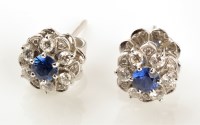 Lot 824 - A pair of sapphire and diamond cluster stud...