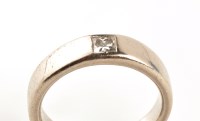 Lot 826 - An 18ct. white gold and diamond ring, the...