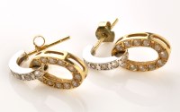 Lot 829 - A pair of 18ct. gold and diamond earrings,...