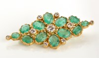 Lot 836 - A diamond and emerald brooch, the...