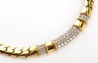 Lot 837 - An 18ct. yellow gold and diamond necklace, of...