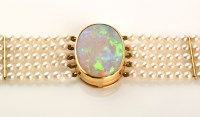 Lot 839 - An opal and cultured pearl bracelet, the...