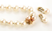 Lot 844 - A single uniform row of cultured pearls, each...