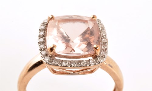 Lot 853 - A morganite and diamond cluster ring, the...