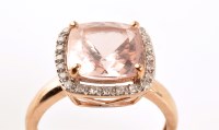 Lot 853 - A morganite and diamond cluster ring, the...