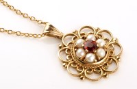 Lot 866 - A garnet, cultured pearl and 9ct. yellow gold...