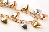Lot 870 - A 9ct. gold bracelet, the twist pattern links...