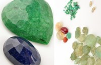 Lot 897 - A quantity of loose gemstones, some in carved...