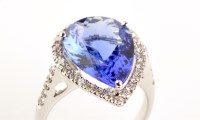 Lot 898 - A tanzanite and diamond cluster ring, the pear...