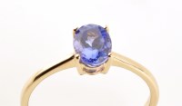 Lot 900 - A single stone tanzanite ring, the oval facet...