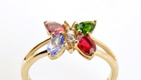 Lot 901 - A gemstone set butterfly pattern ring, set...