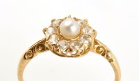 Lot 905 - A cultured pearl and diamond cluster ring, the...