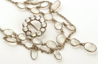 Lot 906 - An Edwardian moonstone fringe necklace, set...