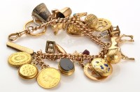 Lot 910 - A 9ct. yellow gold bracelet, of curb links,...