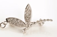 Lot 921 - A diamond set dragonfly brooch, the wings pave...