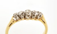 Lot 927 - A five stone diamond ring, the old cut...