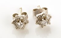 Lot 940 - A pair of diamond stud cluster earrings, the...