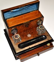 Lot 967 - A Victorian burr walnut and ebonised desk...