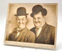 Lot 983 - A signed photograph of Stan Laurel and Oliver...