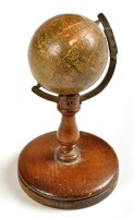 Lot 993 - A Johnston's miniature globe, Edinburgh and...