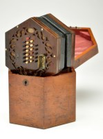 Lot 998 - A 19th Century rosewood hexagonal concertina,...