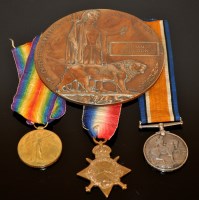 Lot 1031 - A group of WWI medals and plaque awarded to...