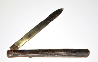 Lot 1043 - A 19th Century large folding knife, the 9in....