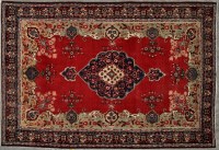 Lot 1050 - A Persian Tabriz carpet, the central medallion...