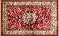 Lot 1052A - A Kashmir rug, the central medallion and red...