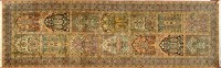 Lot 1054 - A modern silk Persian runner, decorated with...