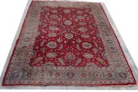 Lot 1056 - A Persian Tabriz carpet, the field with full...